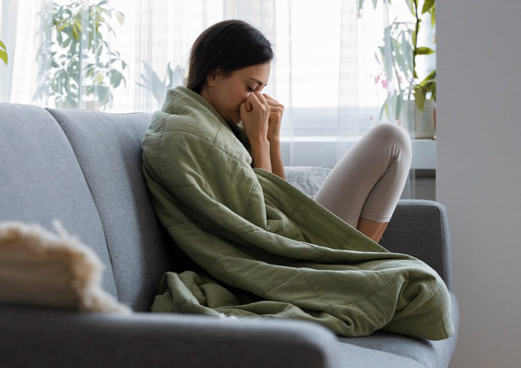 Woman Suffering From Allergies Full Shot